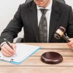 lawyer-filling-document_23-2147984143